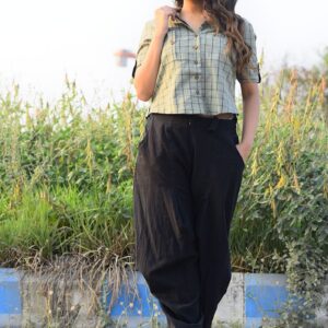 Boxy Shirt, with hand embroidery on shoulders. Teamed with black draped pants