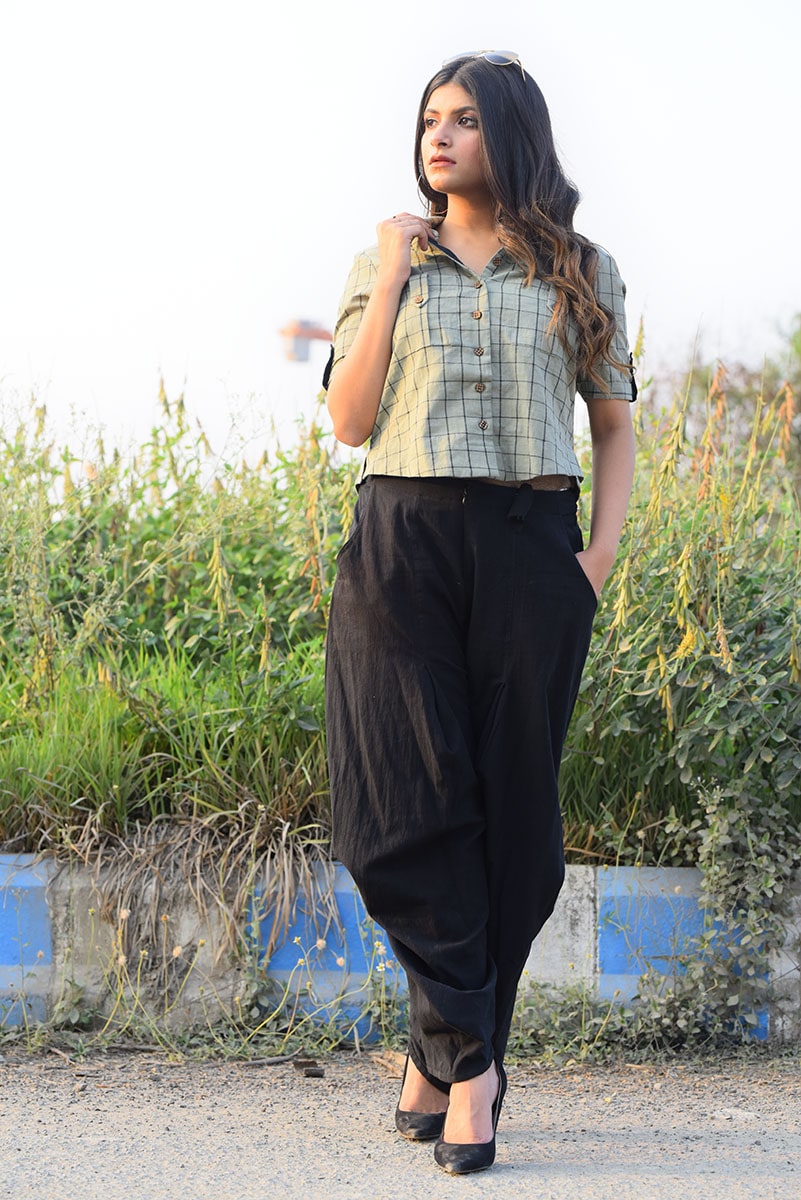 Boxy Shirt, with hand embroidery on shoulders. Teamed with black draped pants