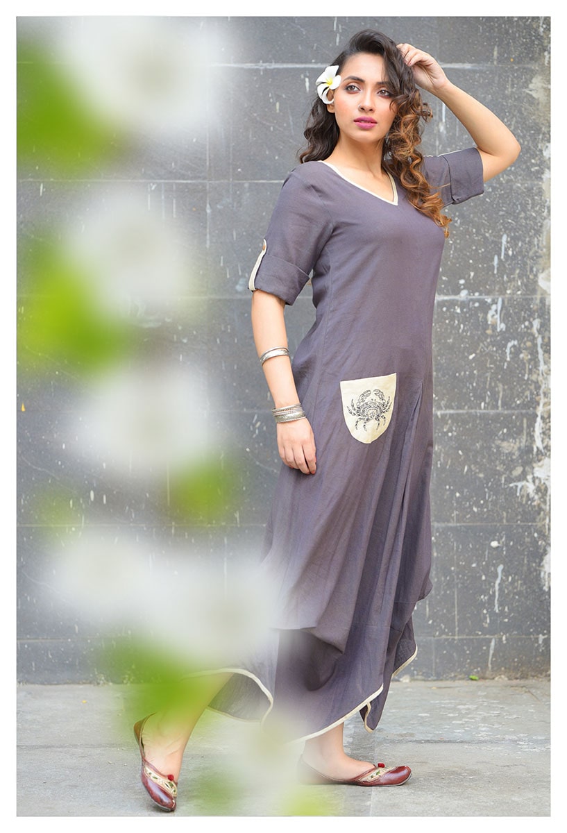 Grey Draped dress with a zodiac pocket