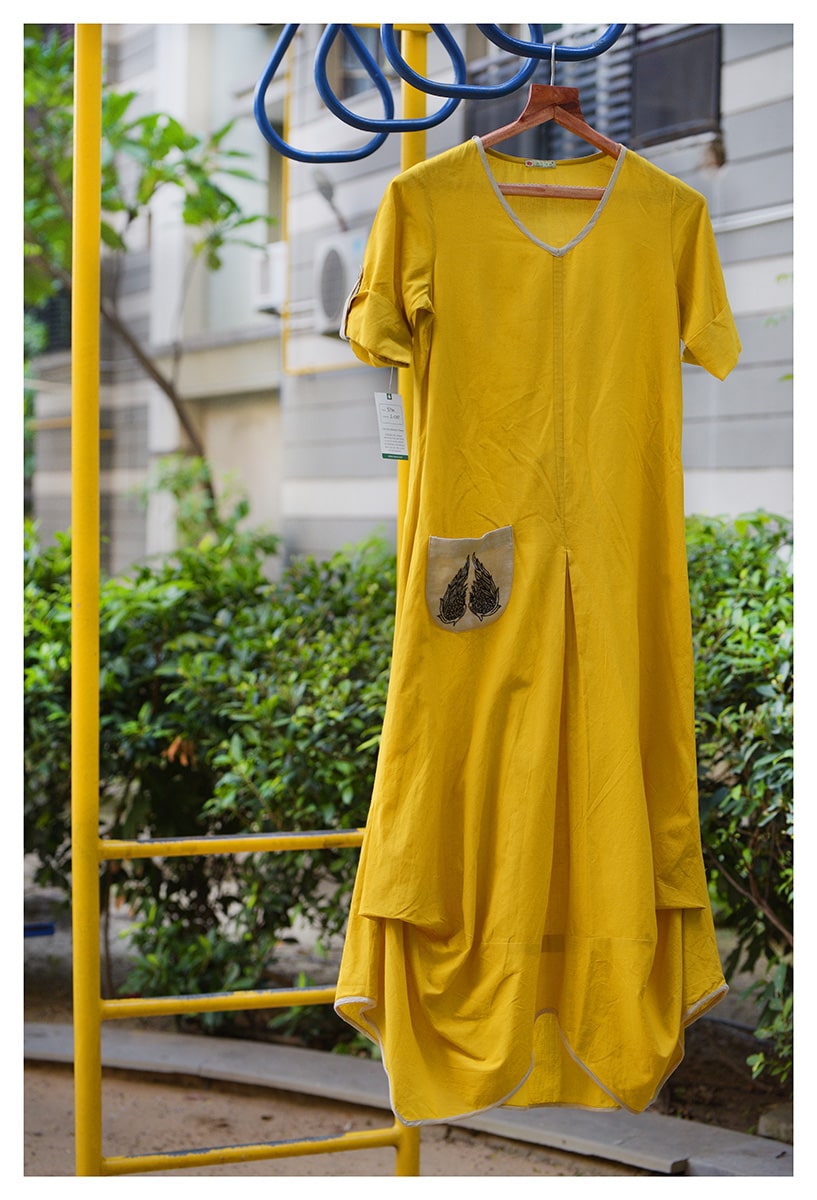 Full length draped cotton dress with hand embroidered pocket