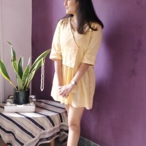 MUTE ORANGE HANDLOOM FIT AND FLAIR DRESS PAIRED WITH OVERLAPPING TIE UP SLEEVELESS JACKET