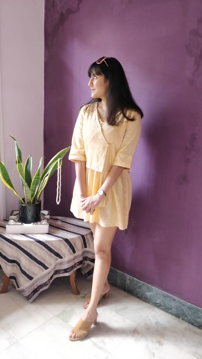 MUTE ORANGE HANDLOOM FIT AND FLAIR DRESS PAIRED WITH OVERLAPPING TIE UP SLEEVELESS JACKET